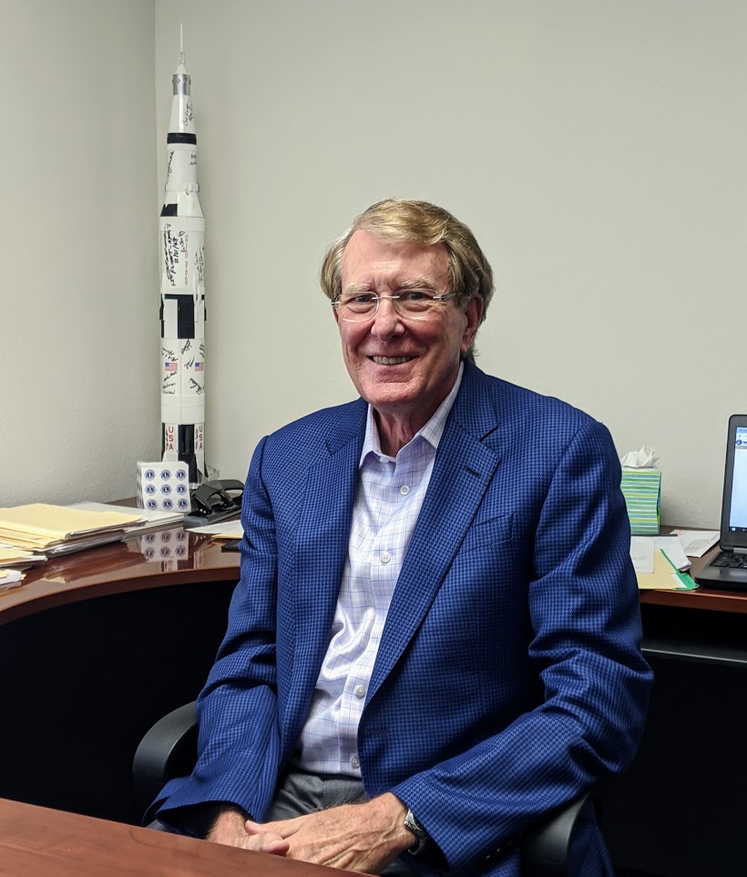 Doug King talks about SAMSAT in his office, photo credit Startups San Antonio